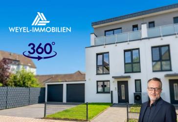 Neuwertiges Einfamilienhaus mit 2 Garagen, Dachterrasse und Wärmepumpe in Toplage von Datteln