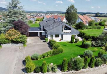 Einfamilienhaus Multifunktionales Wohn- und Renditeobjekt