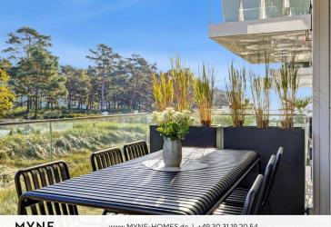 Ferienimmobilie im Miteigentum: Maisonette-Wohnung in erster Meereslinie mit Sauna