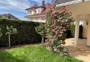 Sonnige 5-Zimmer-Wohnung mit privatem Garten und 2 TG-Stellplätzen - Kurzfristig beziehbar!