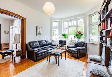 Großzügige, möblierte Erdgeschosswohnung mit zwei Terrassen und Wintergarten in Hamburg-Niendorf