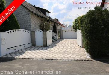 Exklusives Zweifamilienhaus mit 3 Einheiten, Erdwärmepumpe & Wellnessbereich in ruhiger Lage