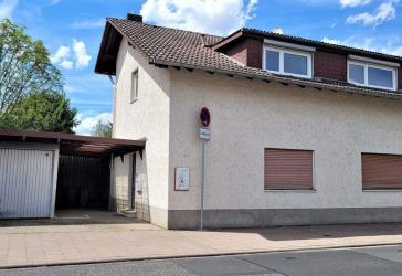 Wohnen und Arbeiten im Einklang. Wohn- und Geschäftshaus mit einer 3 Zimmer Wohnung, Büroetage und Garage!