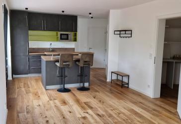 Moderne 2-Zimmer-Wohnung mit Balkon, Einbauküche und Fußbodenheizung im Ortsteil Sonnenhügel. Ideal für Singles!