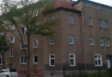 Gebäudekomplex aus 4 Mehrfamilienhäusern und Garagenhof