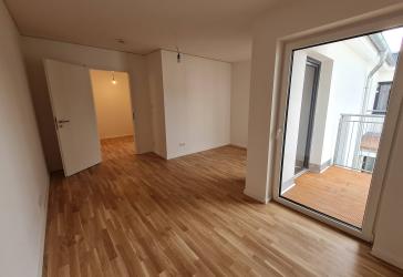 Schicke 4- Zimmerwohnung mit Parkett, Einbauküche, Balkon u. guter Energieeffizienz