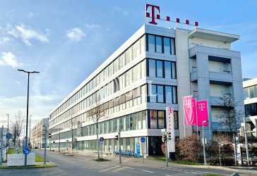 *JLL* - Modernes Bürogebäude am Rheinufer