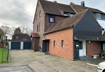 Vermietetes Mehrfamilienhaus mit separaten Gärten sowie zwei Garagen in Sackgassenlage!