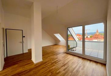 Gemütliche 3-Zimmer DG-Wohnung mit Loggia im Stadtzentrum von Bad Krozingen