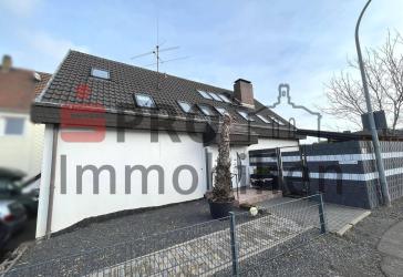 Großes Zweifamilienhaus mit 3 Garagen und Garten!