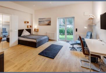 Möbliert: Modernes Apartment mit Garten in hervorragender Lage