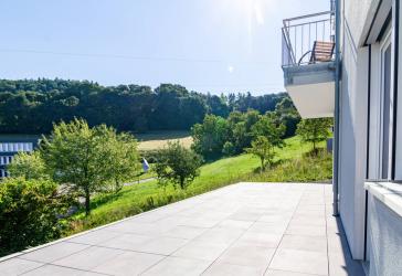 Moderne Erdgeschosswohnung auf dem Hünerberg mit weitläufiger Terrasse und Wiesentalblick