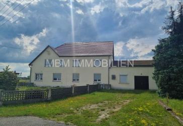 Traumhaftes Grundstück mit Einfamilienhaus in idyllischer Lage