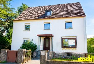 Vorstadtanwesen mit gepflegtem Garten, Charme und Entwicklungsmöglichkeiten in Aschaffenburg