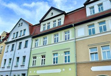 Kapitalanlage mit Charme: Vermietete Altbauwohnung in historischer Stadtvilla