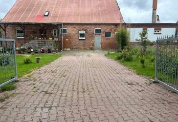 Einseitig angebautes Einfamilienhaus mit Teilkeller in Toddin OT Gramnitz Hof