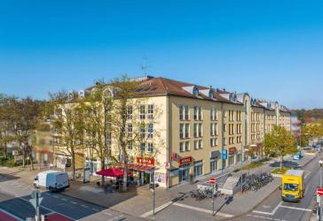 Etabliertes Gewerbeensemble mit Nahversorgungscharakter in frequentierter Lage Münchens