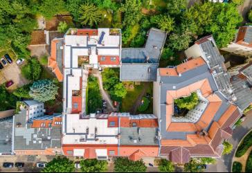 Renditeträchtiges Mehrfamilienhaus mit erheblichem Entwicklungspotenzial in begehrter ruhiger Lage.