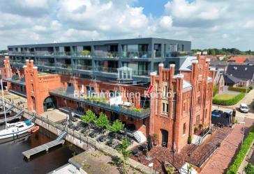 Wohnen am Wasser! Neuwertige Wohnung mit luxuriöser Ausstattung, PKW-Stellplatz und Terrasse mit Wasserblick!