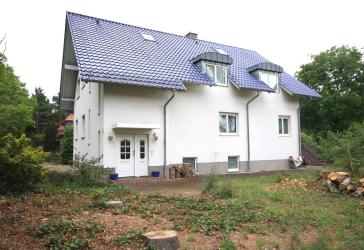 Großzügiges Einfamilienhaus mit Einliegerwohnung auf sonnigem Südgrundstück