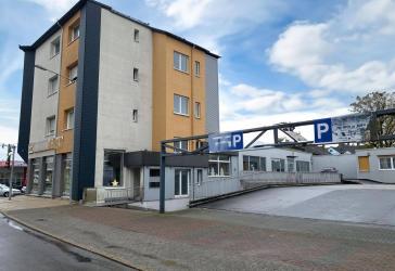 Vermietetes Wohn- und Geschäftshaus mit Lagerflächen sowie einem Parkdeck und einer Tiefgarage!