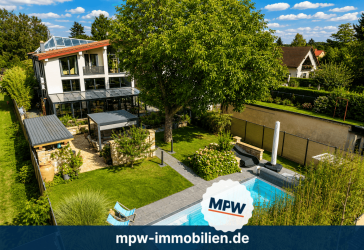 Drinnen draußen wohnen: Pool, Außenküche & außergewöhnliche Architektur