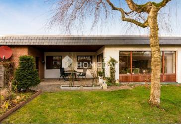 Attraktiver Bungalow mit Terrassengarten, EBK und Garage in vorteilhafter Lage