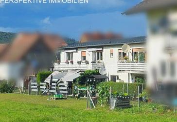 Vermietetes Mehrfamilienhaus + Baugrundstück und Garagen