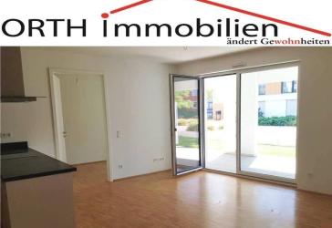 3 Zimmer EG mit Einbauküche, Sonnenterrasse + Zugang zum Gartenbereich.
