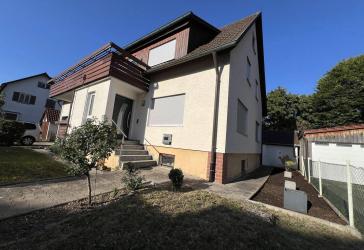 2-Familienhaus mit Garten und großer Garage