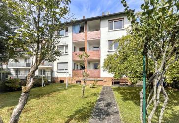 Attraktives Mehrfamilienhaus mit sechs Wohneinheiten, ausgebauter Dachfläche und Garten