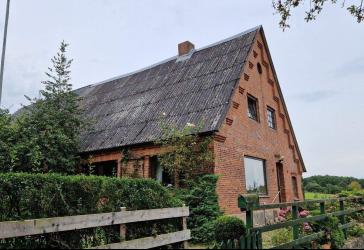 Renovierungsbedürftiges Einfamilienhaus in Westensee - großes Traumgrundstück mit viel Potenzial