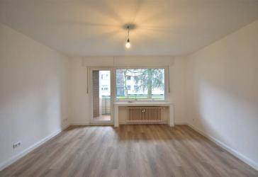 Familien aufgepasst! Sanierte 4-Zi EG-Whg mit Balkon in ruhiger Lage