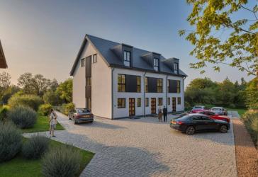 Reihenmittelhaus – 3 moderne Wohneinheiten mit großen Fensterflächen & Garten