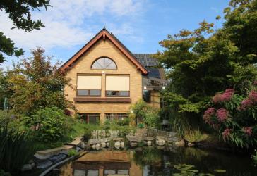 Exklusive Immobilie mit Pool, Sauna und Paradiesgarten