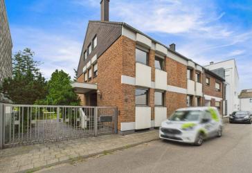 Repräsentatives Mehrfamilienhaus mit Gewerbeeinheit auf parkähnlichem Grundstück!