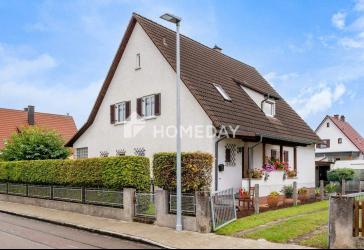 Zweifamilienhaus mit großem Garten, Garage und vielseitigem Potenzial