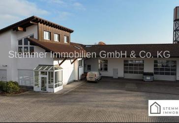 Gewerbegrundstück mit umfangreichen Hallenflächen in verkehrsgünstigem Industriegebiet