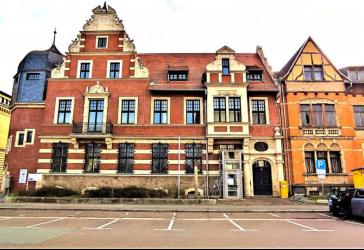 Flexible Gewerbefläche mit Erweiterungspotenzial: Großzügiges EG, Parkplätze & Lagerkapazitäten