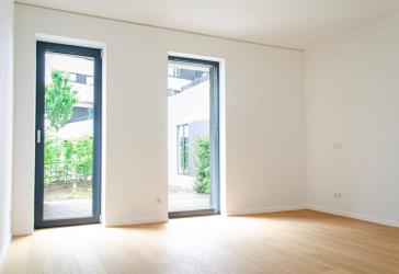 Helles Zweizimmerstudio mit Terrasse ins Grüne und Loggia mit Südausrichtung // Community-Spaces