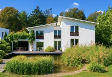 Zweifamilienhaus mit flexiblem Nutzungskonzept, Schwimmteich & Traumgarten