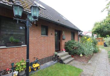 Familienfreundliches Reihenhaus mit pflegeleichten Garten!
