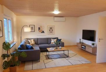 4-Zimmer-Wohnung (ca. 110 m²) mit Balkon, Kamin und Klimaanlage in Lörrach-Hauingen