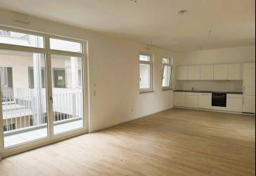 Moderne Wohlfühloase mit sonnigem Balkon, offener Küche & elegantem Tageslichtbad in zentraler Lage
