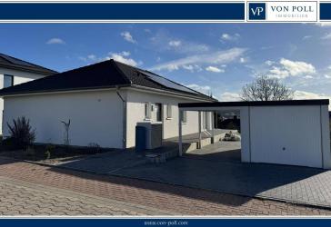 Exklusives Wohnen auf einer Ebene - Traumhafter und lichtdurchfluteter Bungalow im Neubaugebiet
