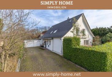 Bergheim: Freistehendes Einfamilienhaus mit Großgarage, sonniger Gartenidylle und Vollkeller