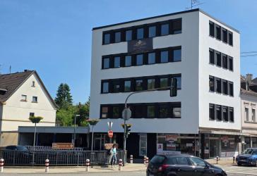 Mehrparteienhaus + Gewerbe + Parkhaus in Ottweiler, Rendite