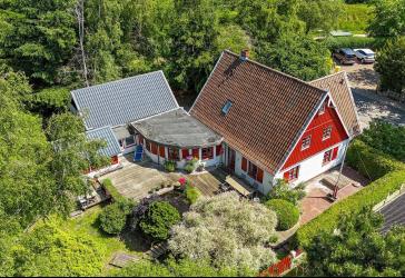 Toplage Ording: Einfamilienhaus auf großem Grundstück mit Neubauoption