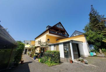 Investoren aufgepasst: Vollvermietetes Ensemblehaus mit Wintergarten & Ausgebautem Dachboden