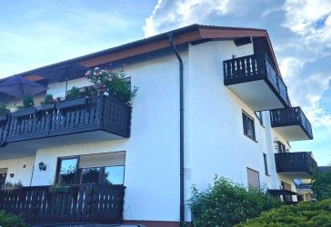 SONNIGE DACHGESCHOSSWOHNUNG MIT TIEFGARAGENSTELLPLATZ UND ANTEILE AM GEMEINSCHAFTSGARTEN